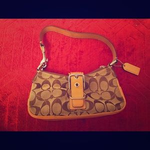 Small tan and brown Coach purse No. F042-6362